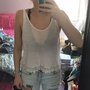 White tank top with crochet trim on bottom